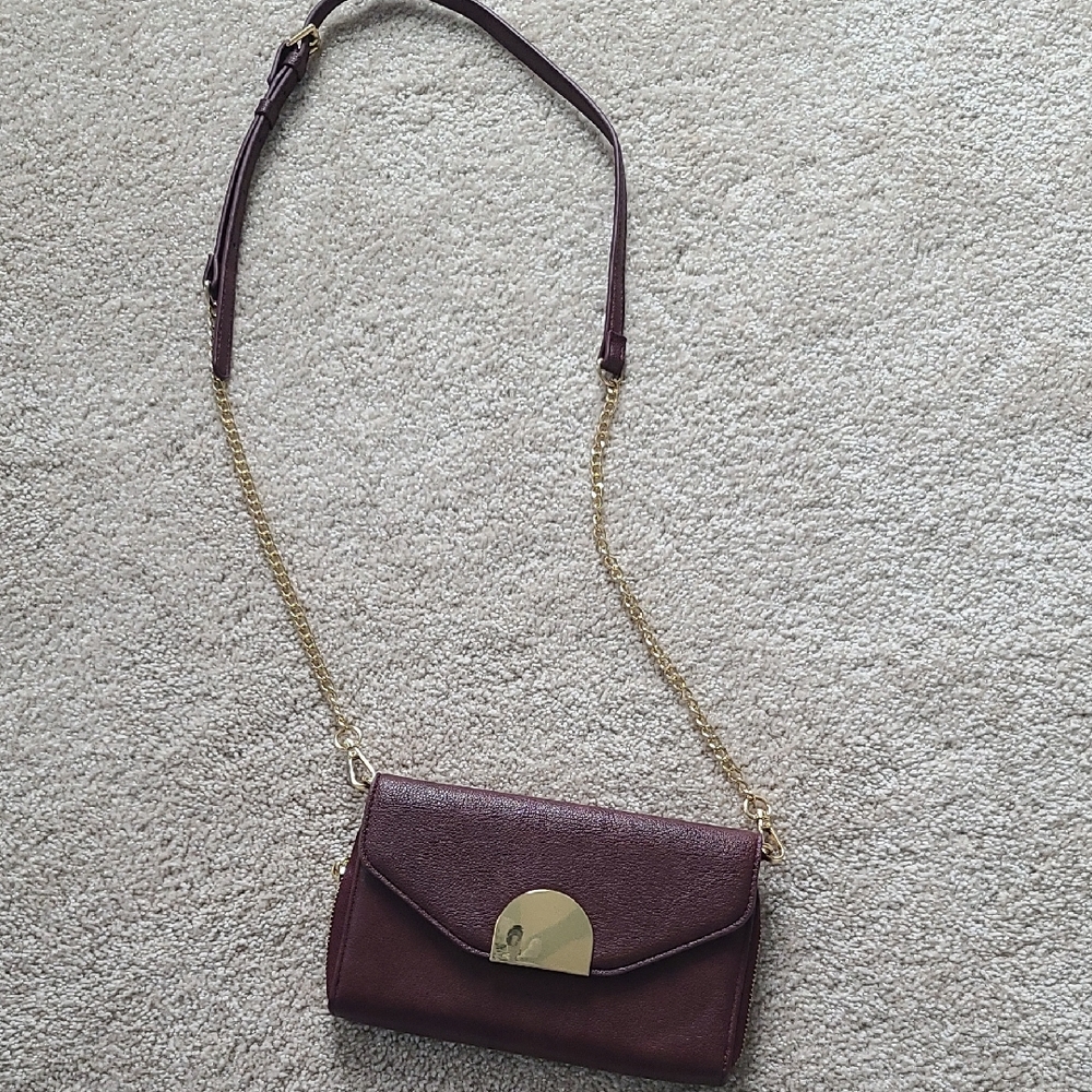 Elegant Burgundy Crossbody Bag with Gold Accents